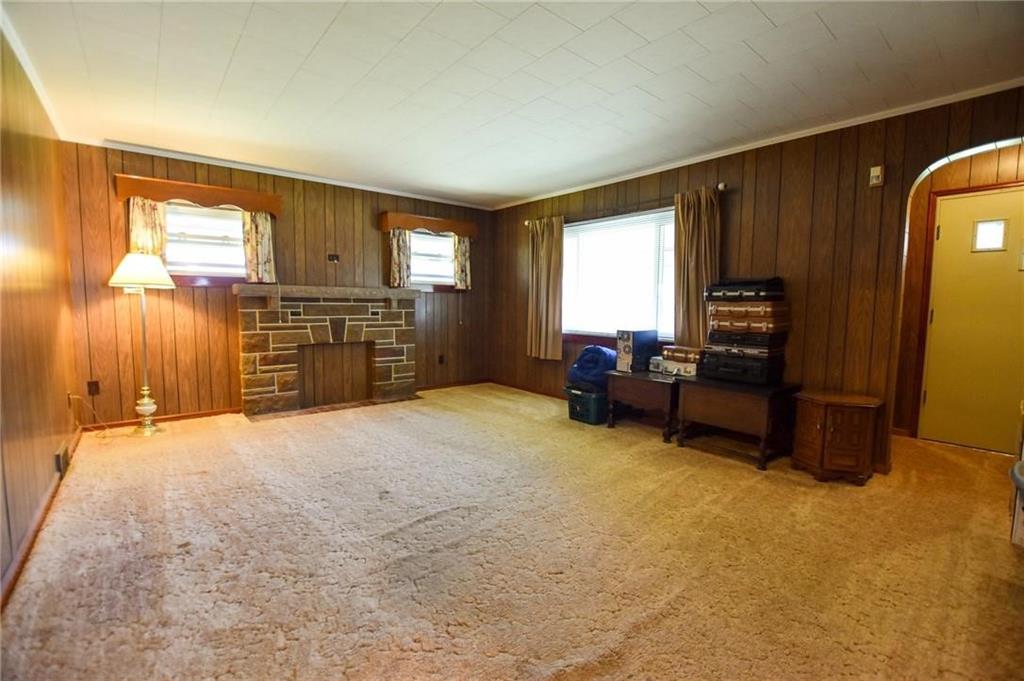 694 Saxonburg Road Butler, PA 16002 - Photo 4 of 10 a room with furniture and a flat screen tv
