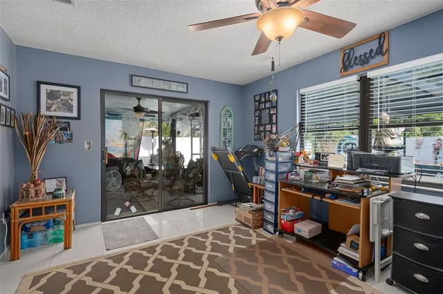 a view of a hallway with wooden shelves
