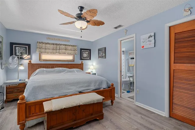 a bedroom with a bed and furniture