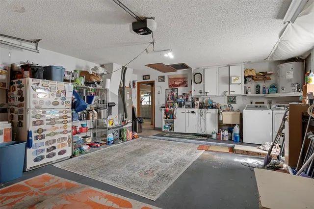 a living room with furniture a window and a ceiling fan