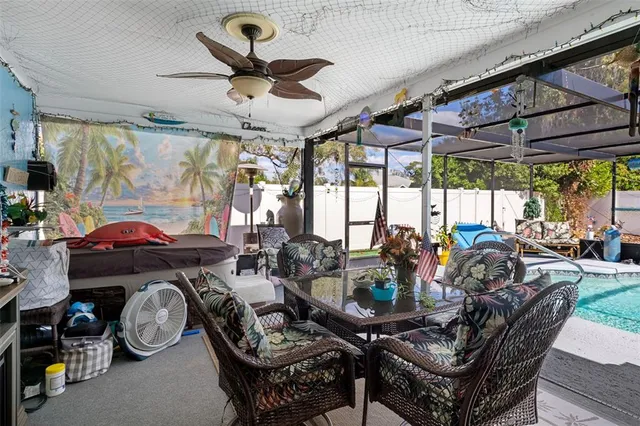 a view of a chairs and table in a patio