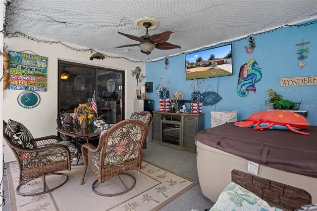 a view of a swimming pool with a patio