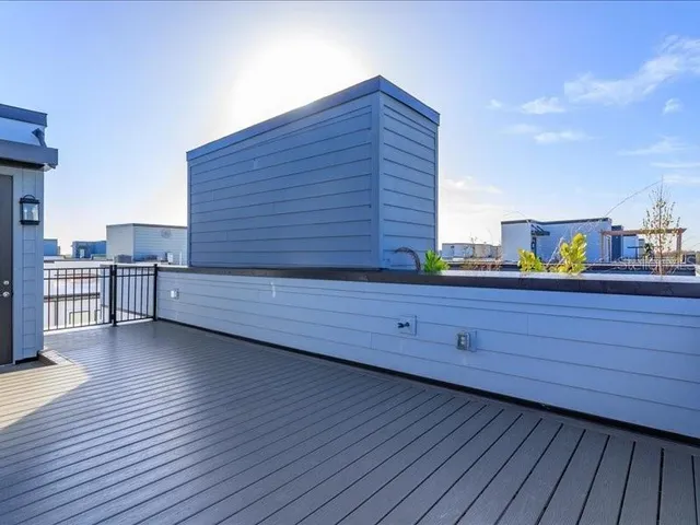 a view of front door and wooden floor