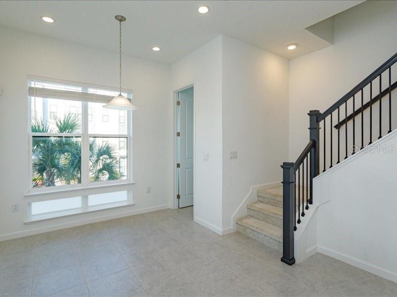 2353 Brix Street Orlando, FL 32804 - Photo 9 of 25 a view of empty room with wooden floor and fan