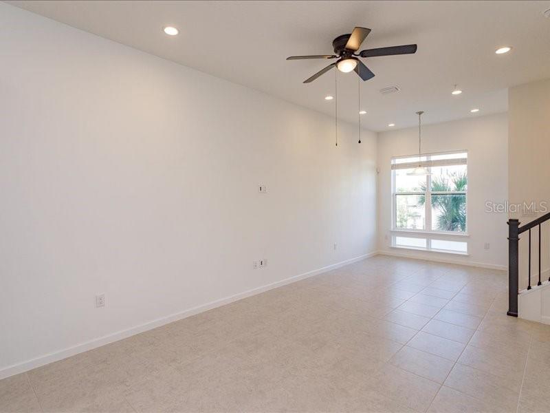 2353 Brix Street Orlando, FL 32804 - Photo 10 of 25 an empty room with windows and fan