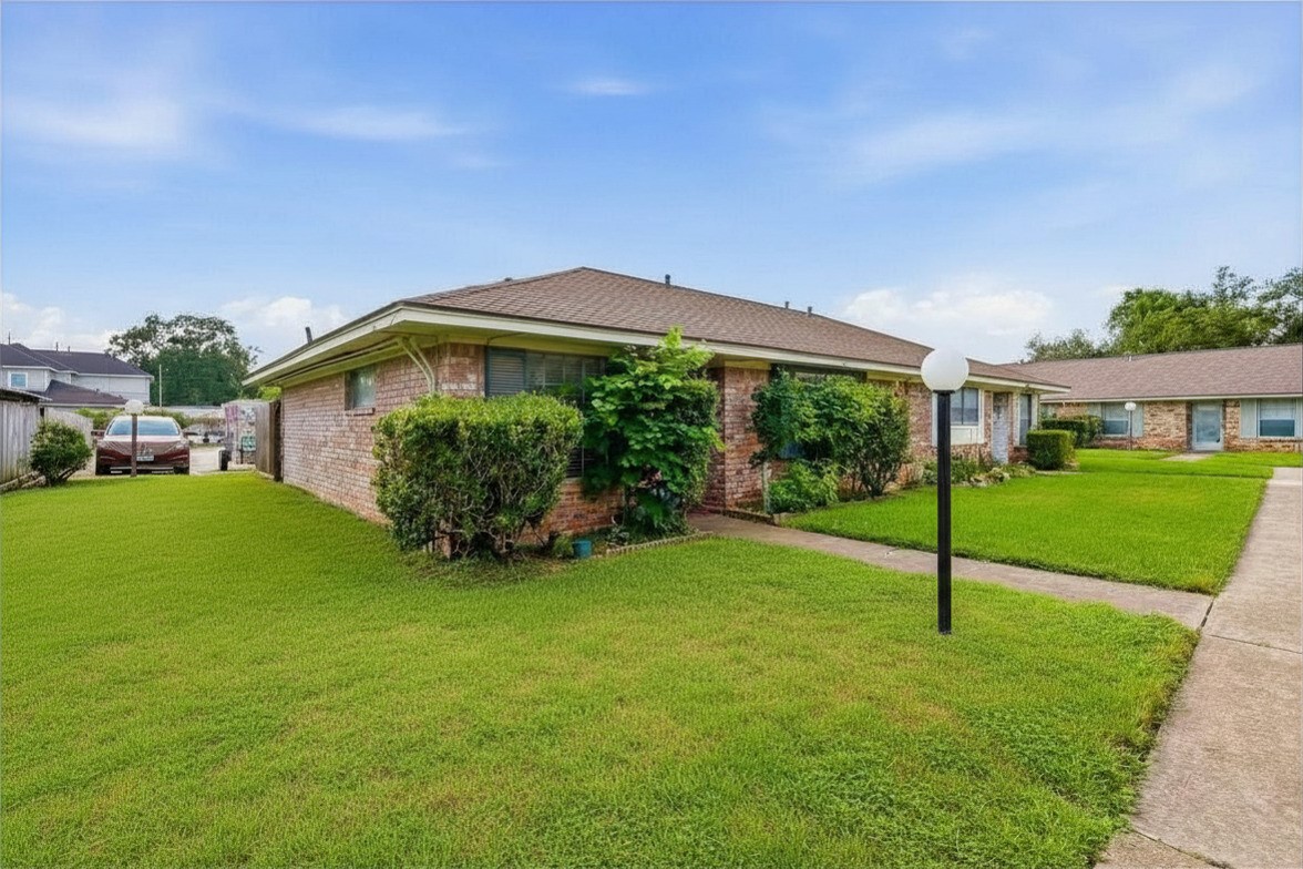 9458 Neuens Road, Unit 9458 Houston, TX 77080 - Photo 17 of 22 Front Exterior. Assigned parking spot is #56 directly behind the unit.