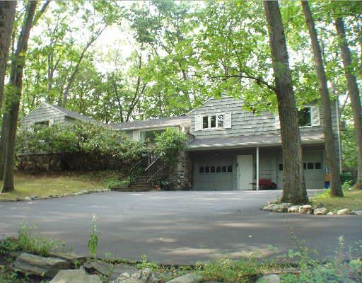 537 Cedar Road Fairfield, CT 06890 - Photo 1 of 1 a view of a house with a yard and potted plants