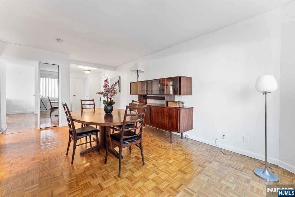 1375 River Road, Unit 1K Edgewater, NJ 07020 - Photo 16 of 27 a view of a dining room with furniture