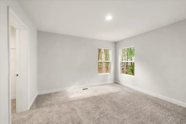 an empty room with windows