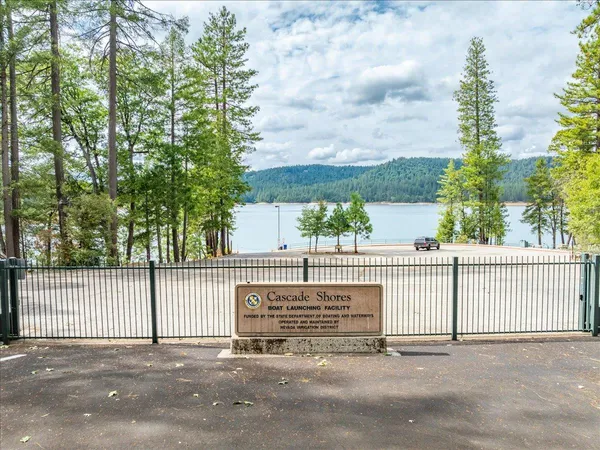 a view of a lake with a building in the background