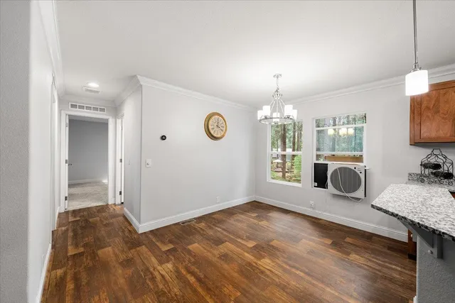 a view of a livingroom with furniture and window