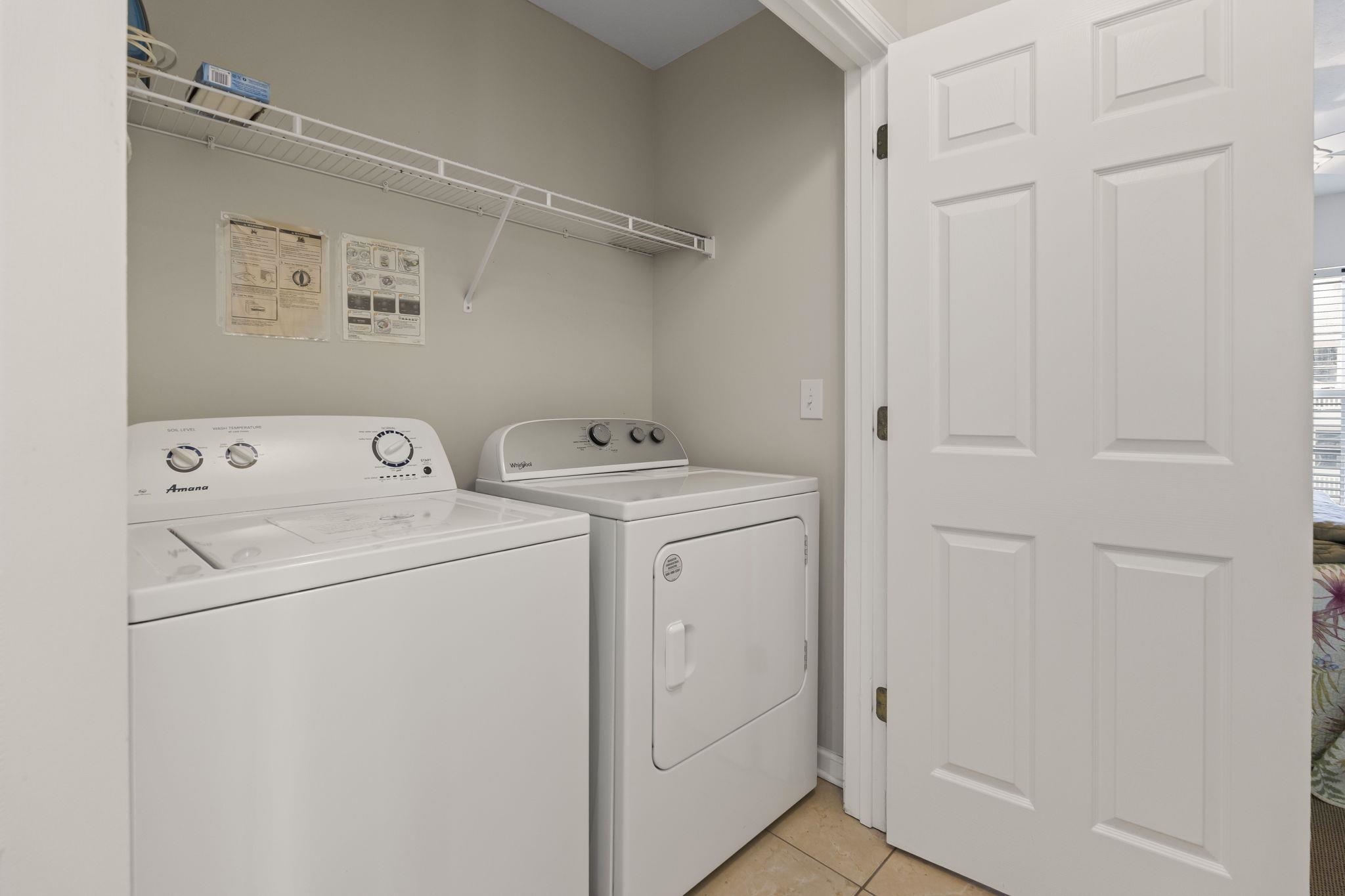 311 B 3rd Avenue North Surfside Beach, SC 29575 - Photo 31 of 39 Laundry room featuring light tile patterned floors and washer and clothes dryer