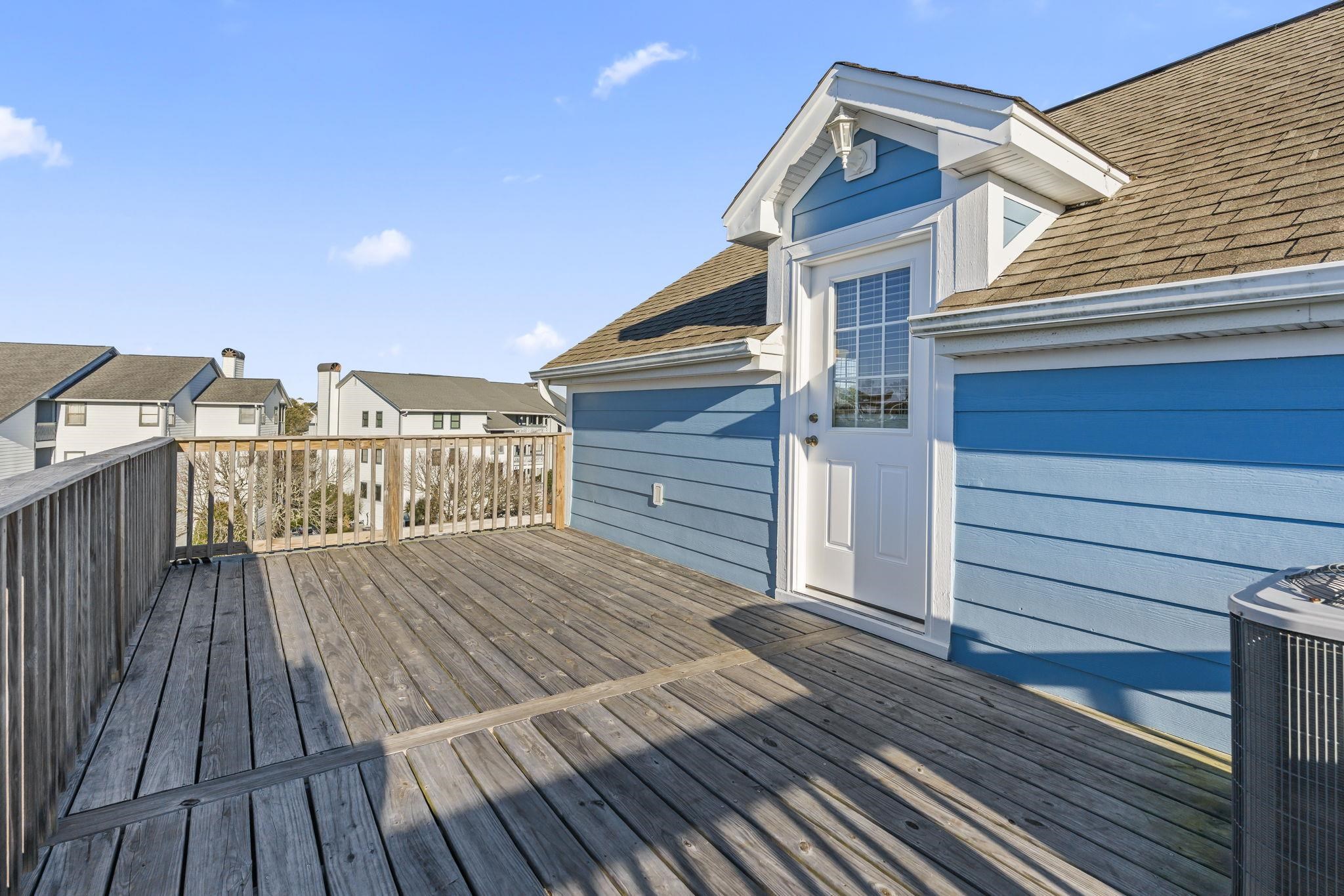 311 B 3rd Avenue North Surfside Beach, SC 29575 - Photo 33 of 39 Wooden terrace with a residential view