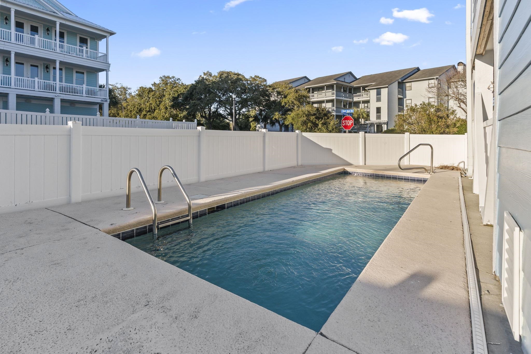 311 B 3rd Avenue North Surfside Beach, SC 29575 - Photo 37 of 39 View of pool with a fenced backyard and a patio area