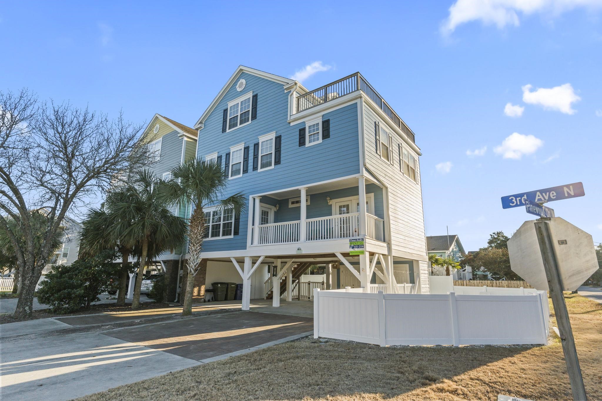 311 B 3rd Avenue North Surfside Beach, SC 29575 - Photo 38 of 39 Raised beach house with a carport and driveway