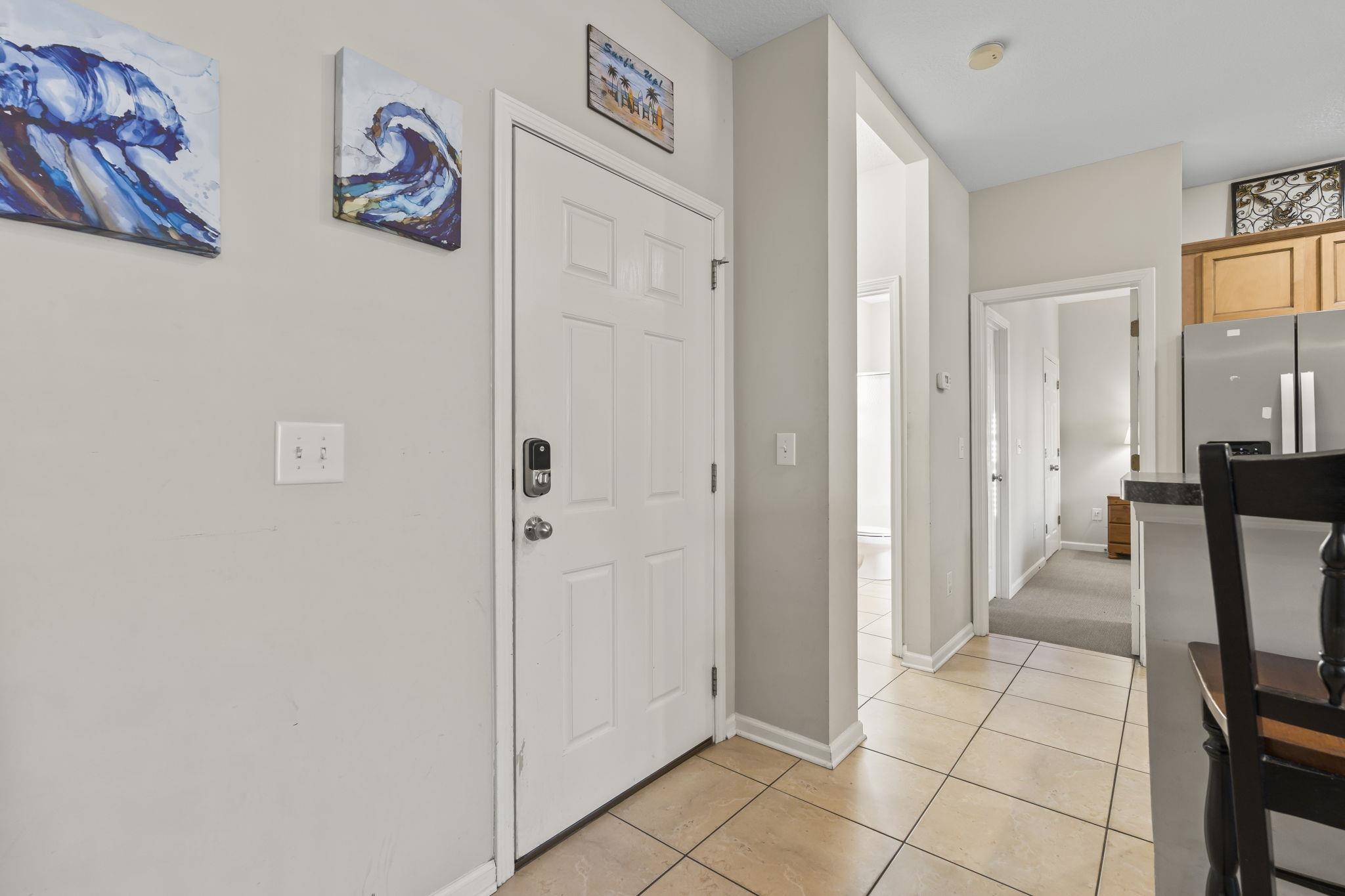311 B 3rd Avenue North Surfside Beach, SC 29575 - Photo 4 of 39 Foyer featuring light tile patterned flooring and baseboards