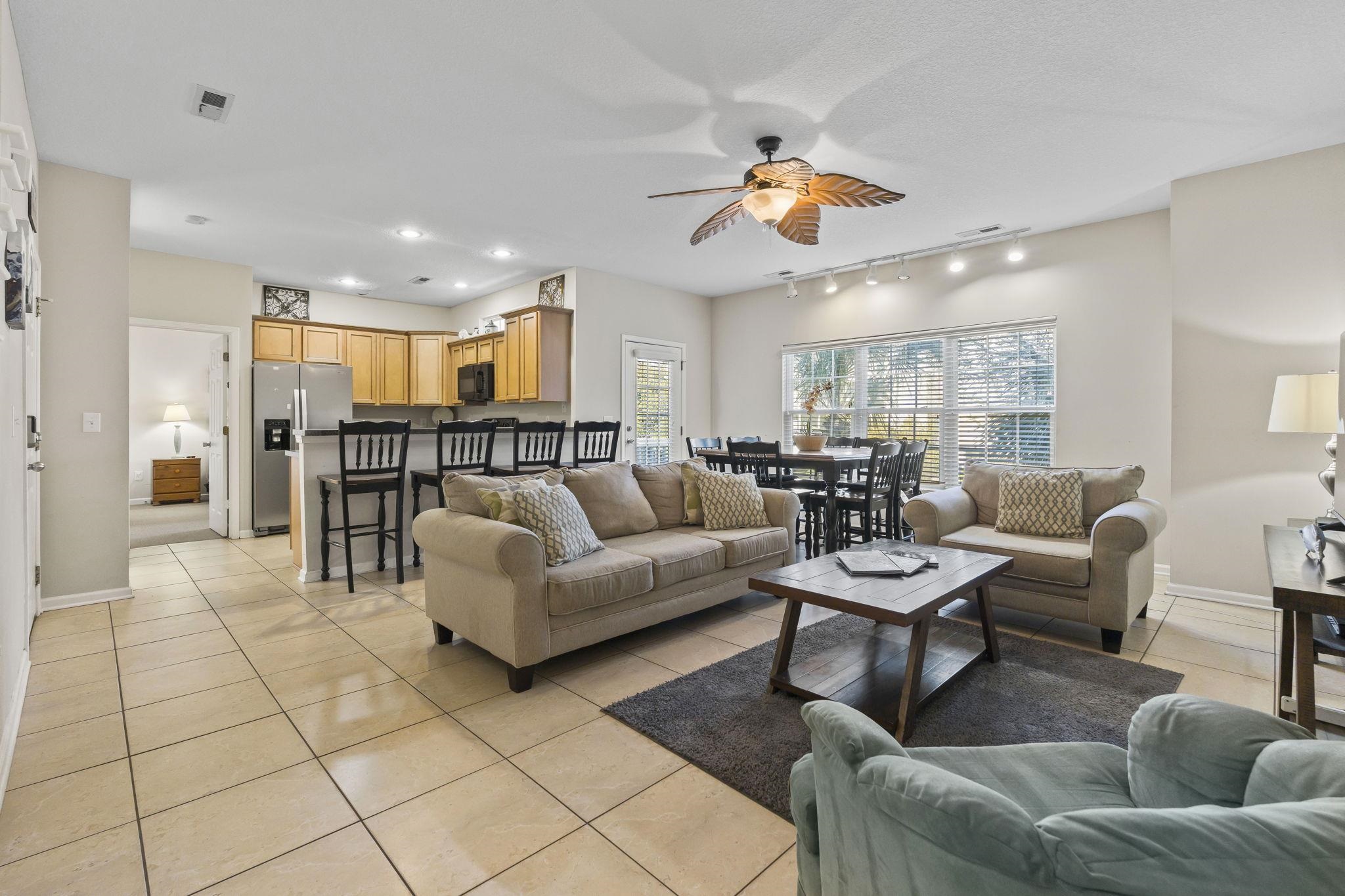 311 B 3rd Avenue North Surfside Beach, SC 29575 - Photo 5 of 39 Living area featuring a ceiling fan, light tile patterned flooring, recessed lighting, and track lighting