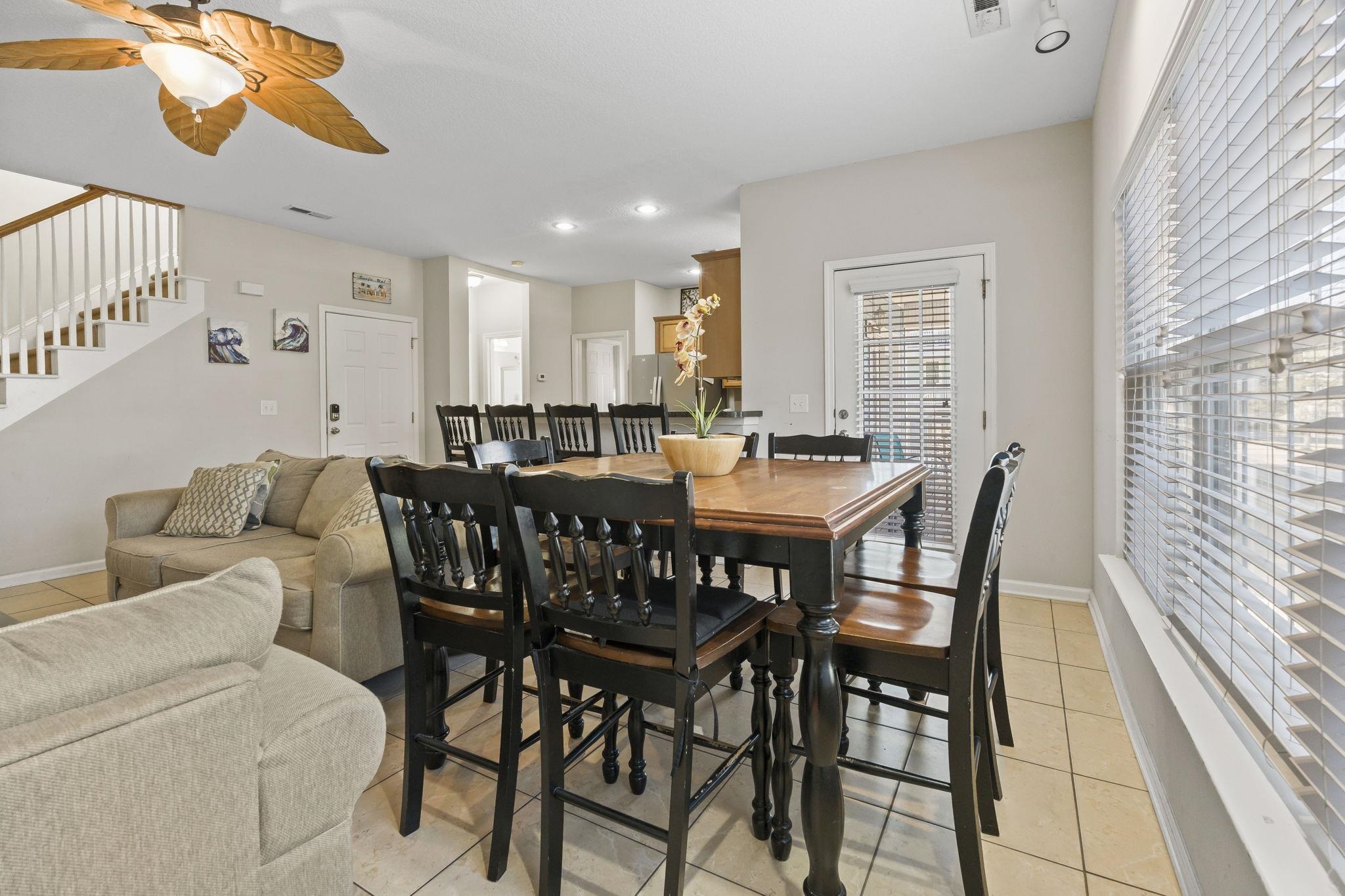 311 B 3rd Avenue North Surfside Beach, SC 29575 - Photo 7 of 39 Dining space with light tile patterned flooring, recessed lighting, stairway, and a ceiling fan