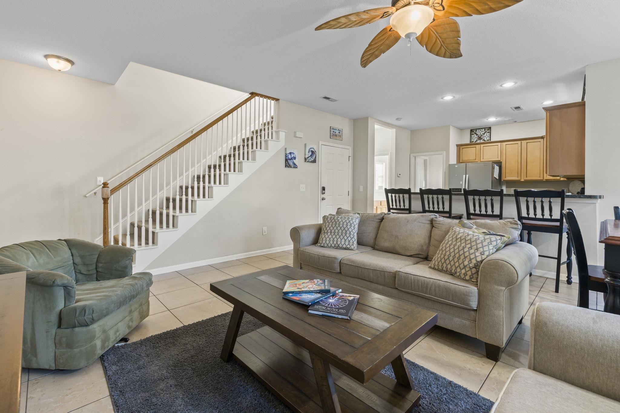 311 B 3rd Avenue North Surfside Beach, SC 29575 - Photo 8 of 39 Living room featuring recessed lighting, stairs, light tile patterned floors, and ceiling fan