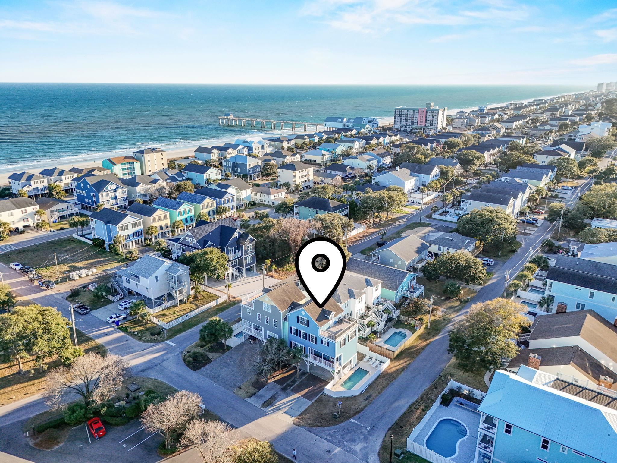 311 B 3rd Avenue North Surfside Beach, SC 29575 - Photo 10 of 39 Aerial view of residential area with a nearby body of water