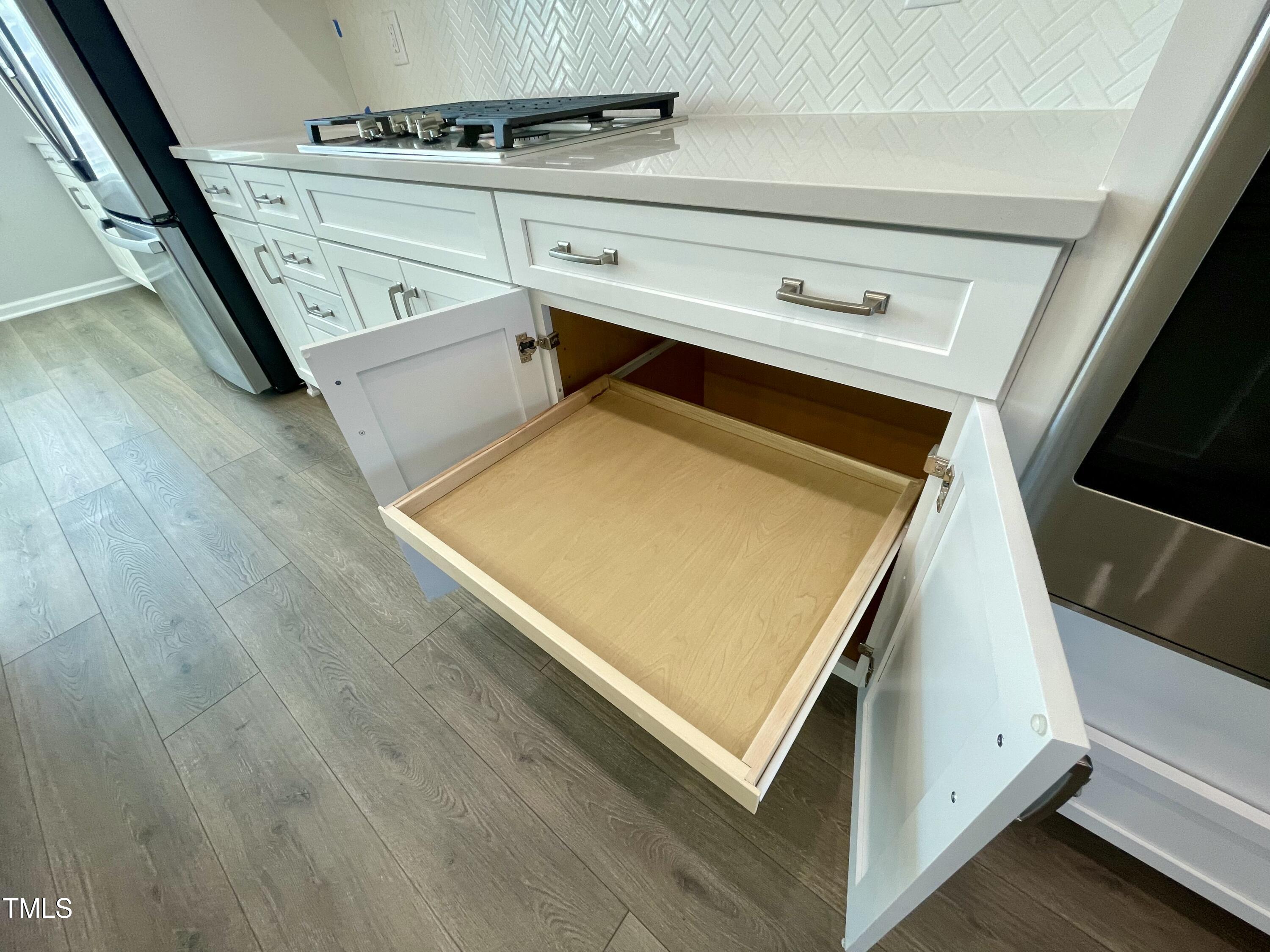 2103 Lambert Road, Unit 62 Cary, NC 27519 - Photo 20 of 77 11. lower cabinet slide out trays