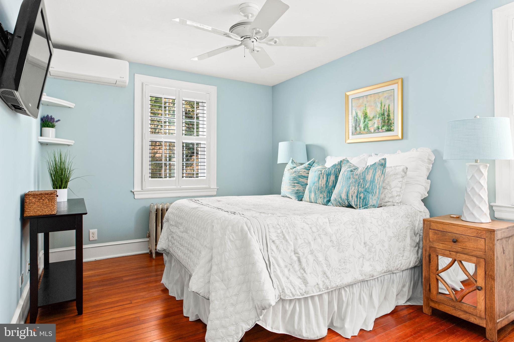 444 St Davids Avenue Wayne, PA 19087 - Photo 13 of 28 a bedroom with a bed and wooden floor