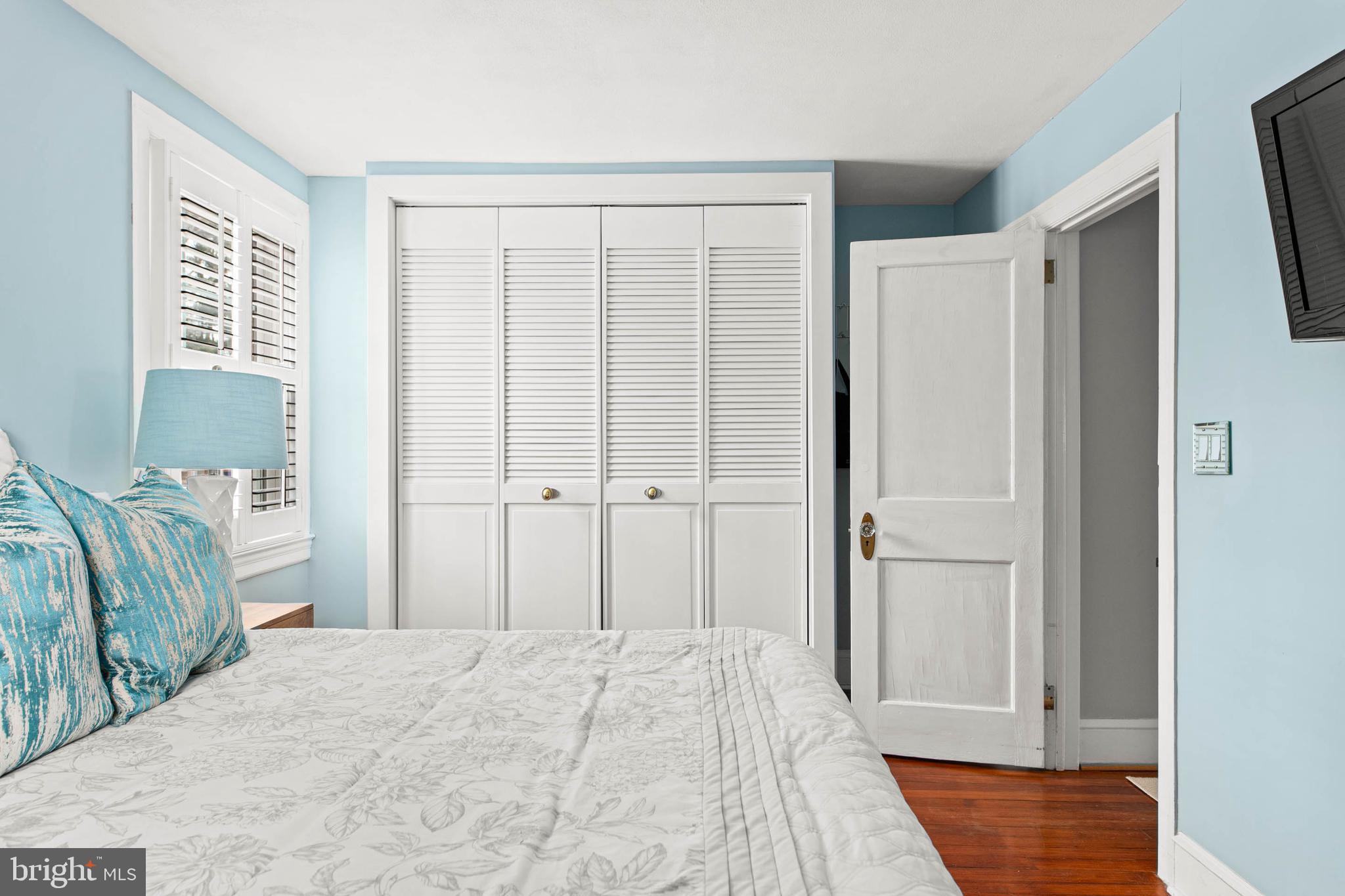 444 St Davids Avenue Wayne, PA 19087 - Photo 14 of 28 a bedroom with a bed and a mirror