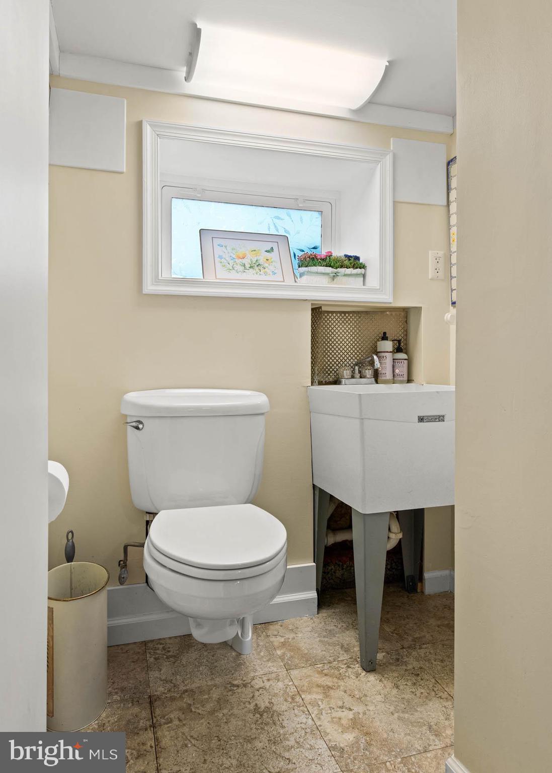 444 St Davids Avenue Wayne, PA 19087 - Photo 24 of 28 a bathroom with a toilet a sink and a window