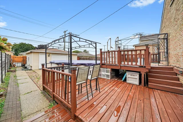 a view of balcony with deck and wooden floor
