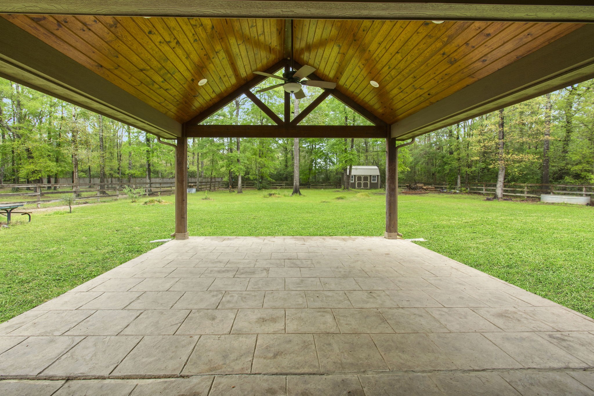 4551 Axis Trail Conroe, TX 77303 - Photo 12 of 12 a view of a house with backyard and a backyard