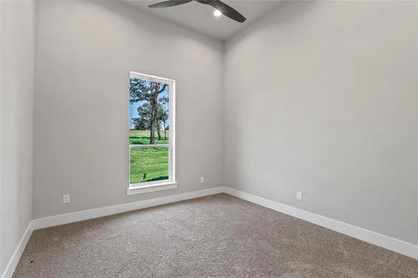 an empty room with windows