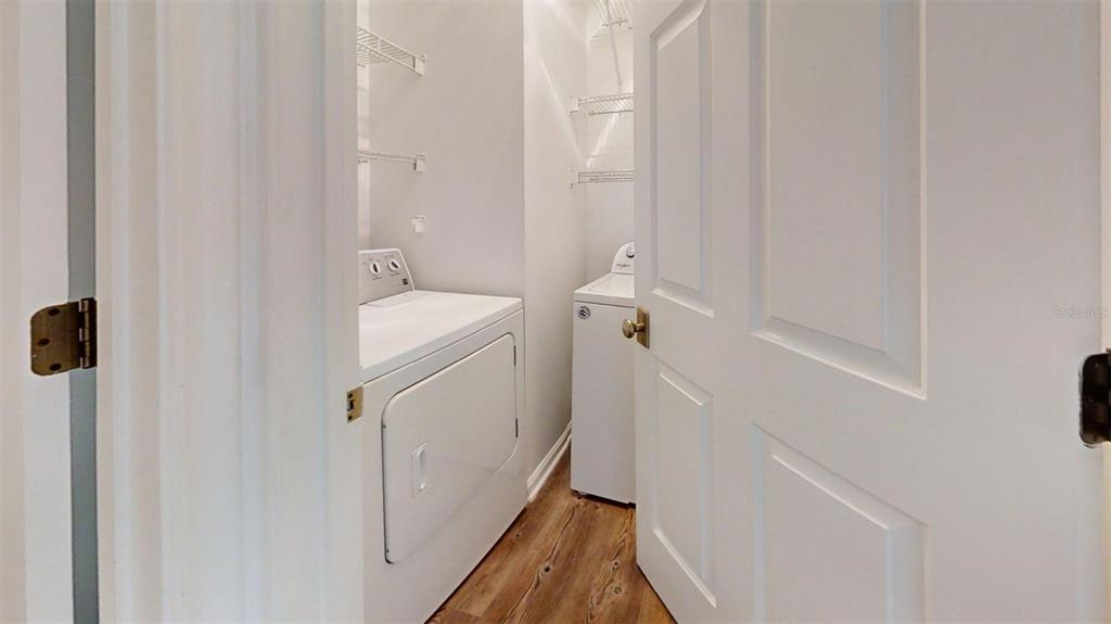 460 Water Street, Unit 460 Celebration, FL 34747 - Photo 13 of 38 a bathroom with a sink and mirror