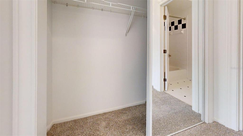460 Water Street, Unit 460 Celebration, FL 34747 - Photo 17 of 38 a view of a hallway with closet