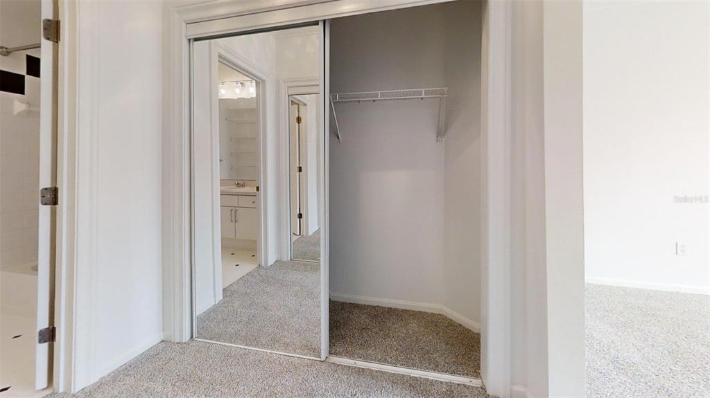 460 Water Street, Unit 460 Celebration, FL 34747 - Photo 18 of 38 a view of a bathroom with mirror