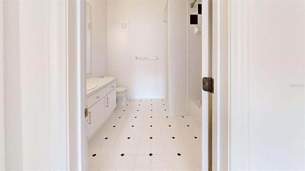 460 Water Street, Unit 460 Celebration, FL 34747 - Photo 19 of 38 a bathroom with a shower