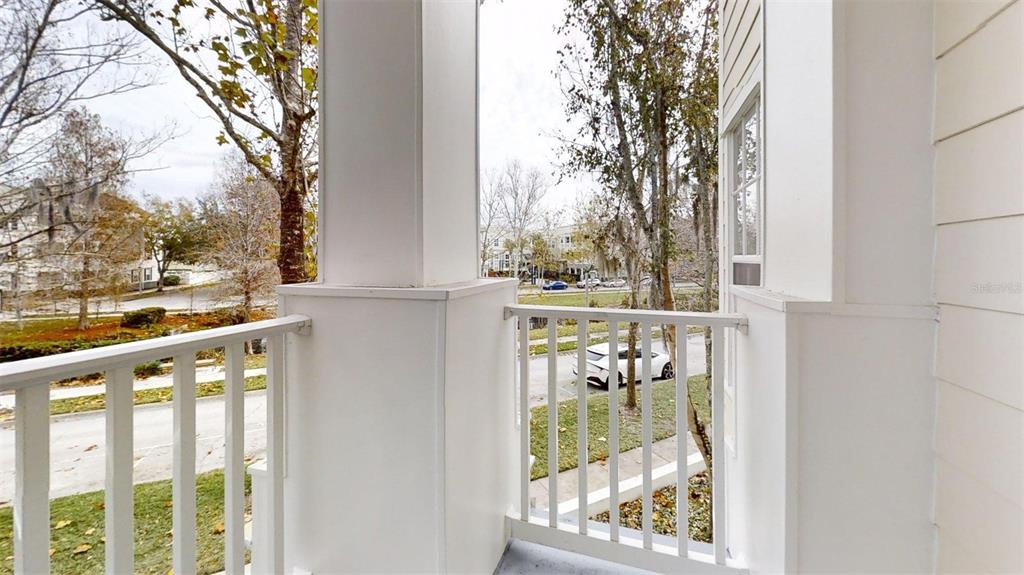 460 Water Street, Unit 460 Celebration, FL 34747 - Photo 21 of 38 a view of a balcony with a pot
