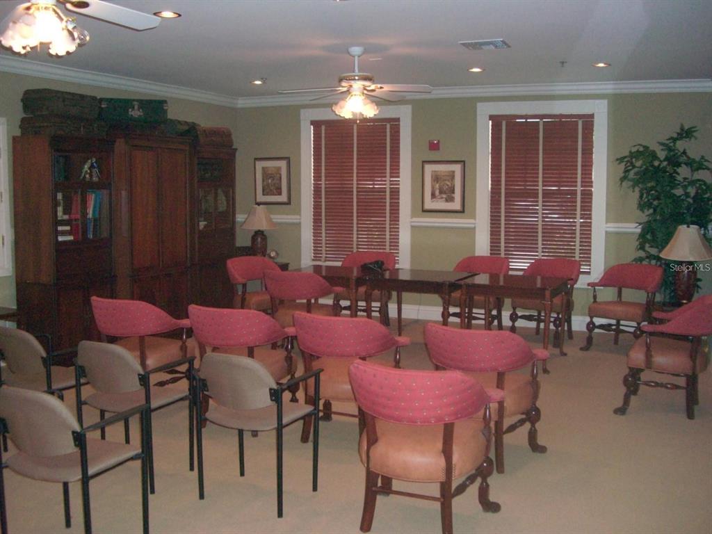 460 Water Street, Unit 460 Celebration, FL 34747 - Photo 25 of 38 a dining room with furniture and window