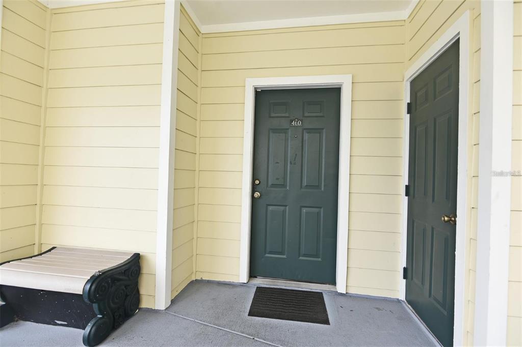 460 Water Street, Unit 460 Celebration, FL 34747 - Photo 3 of 38 a view of front door and bedroom