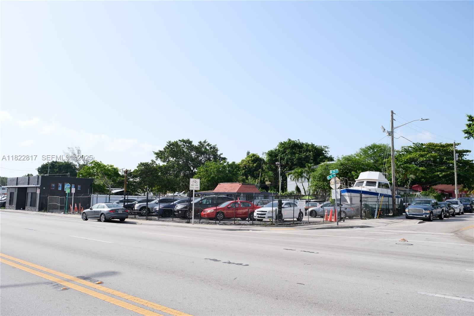 490 Northwest 79th Street Miami, FL 33150 - Photo 3 of 5 a car parked on the side of the road