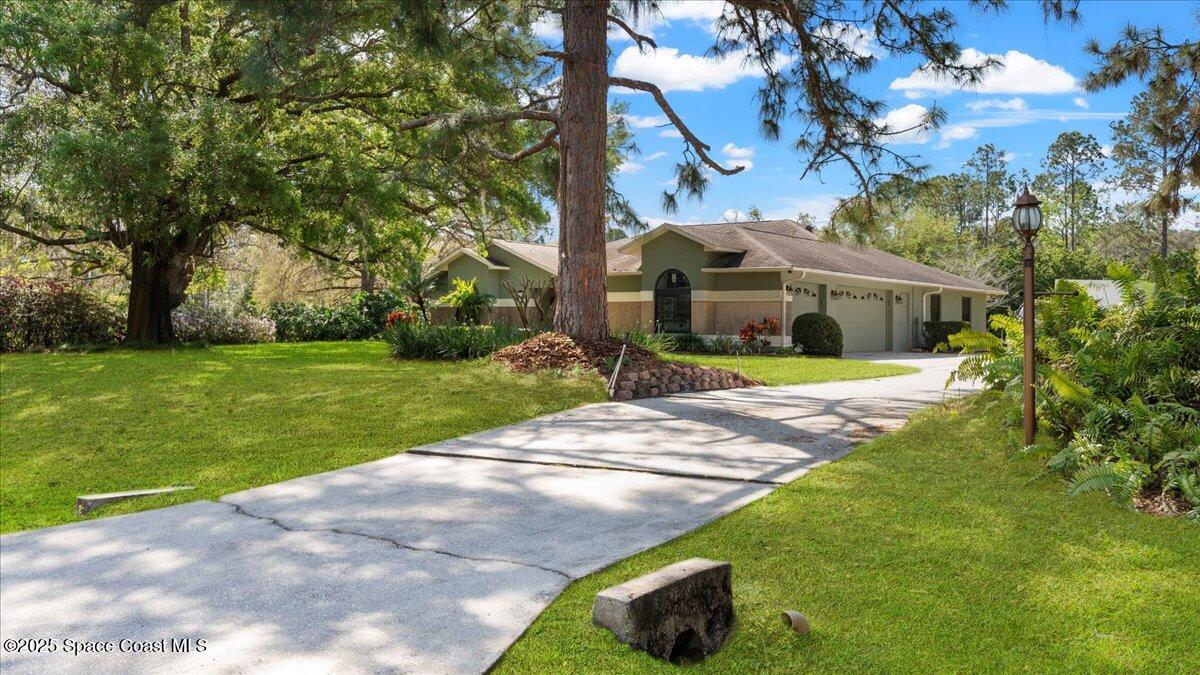 5395 Amy Way Mims, FL 32754 - Photo 4 of 60 04-Exterior Front