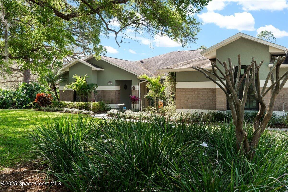 5395 Amy Way Mims, FL 32754 - Photo 9 of 60 09-Exterior Front