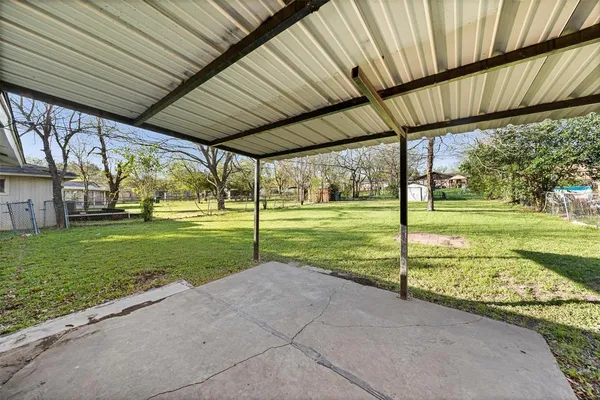 a view of a house with a big yard