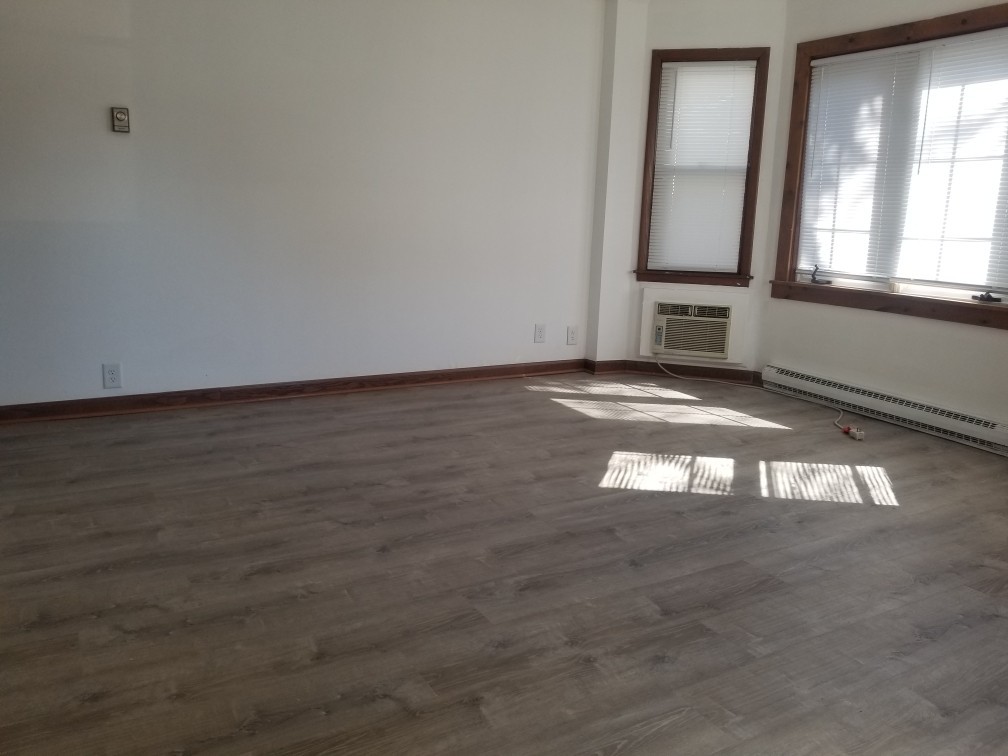 809 Calhoun Street Peru, IL 61354 - Photo 4 of 7 a view of an empty room with a window