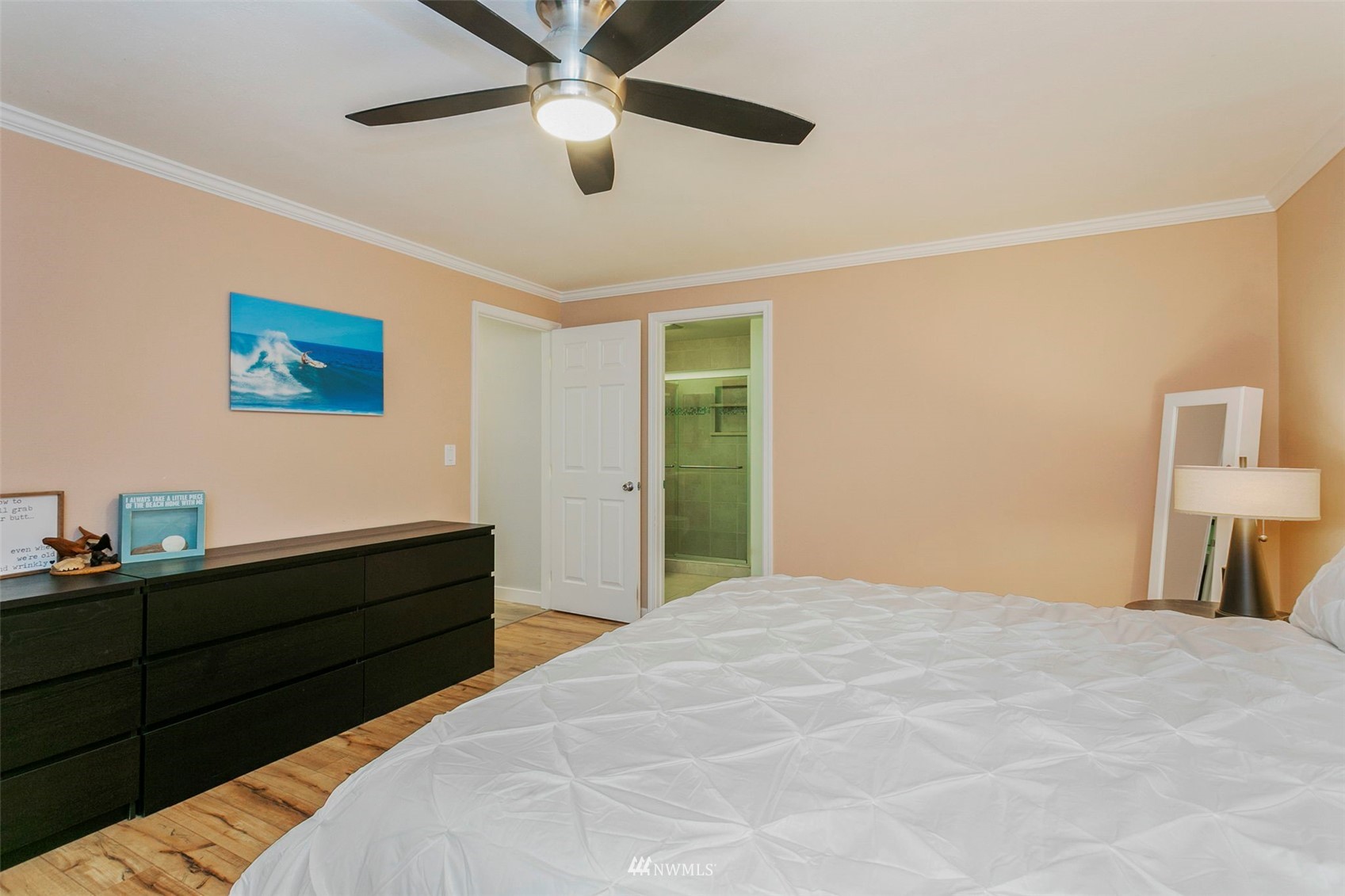610 219th Place Southwest Bothell, WA 98021 - Photo 12 of 25 a bedroom with a bed and a dresser