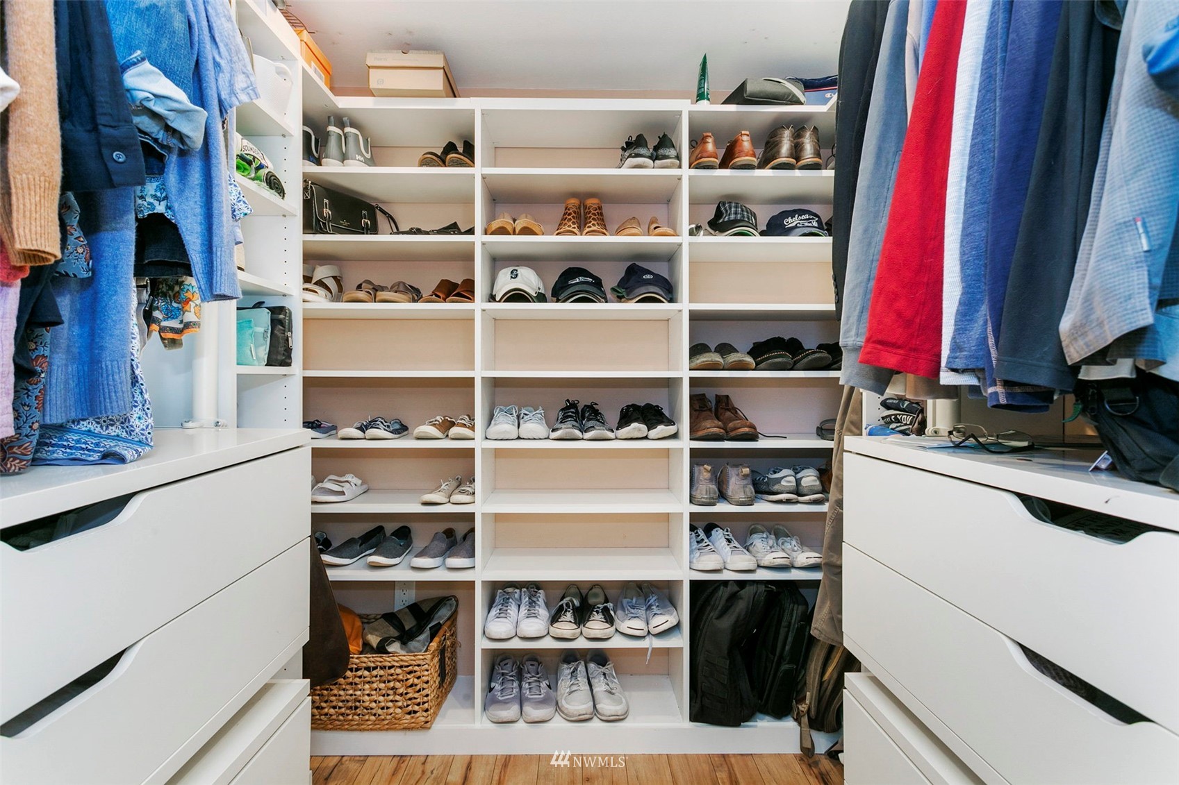 610 219th Place Southwest Bothell, WA 98021 - Photo 14 of 25 a view of walk in closet with clothes and shoes