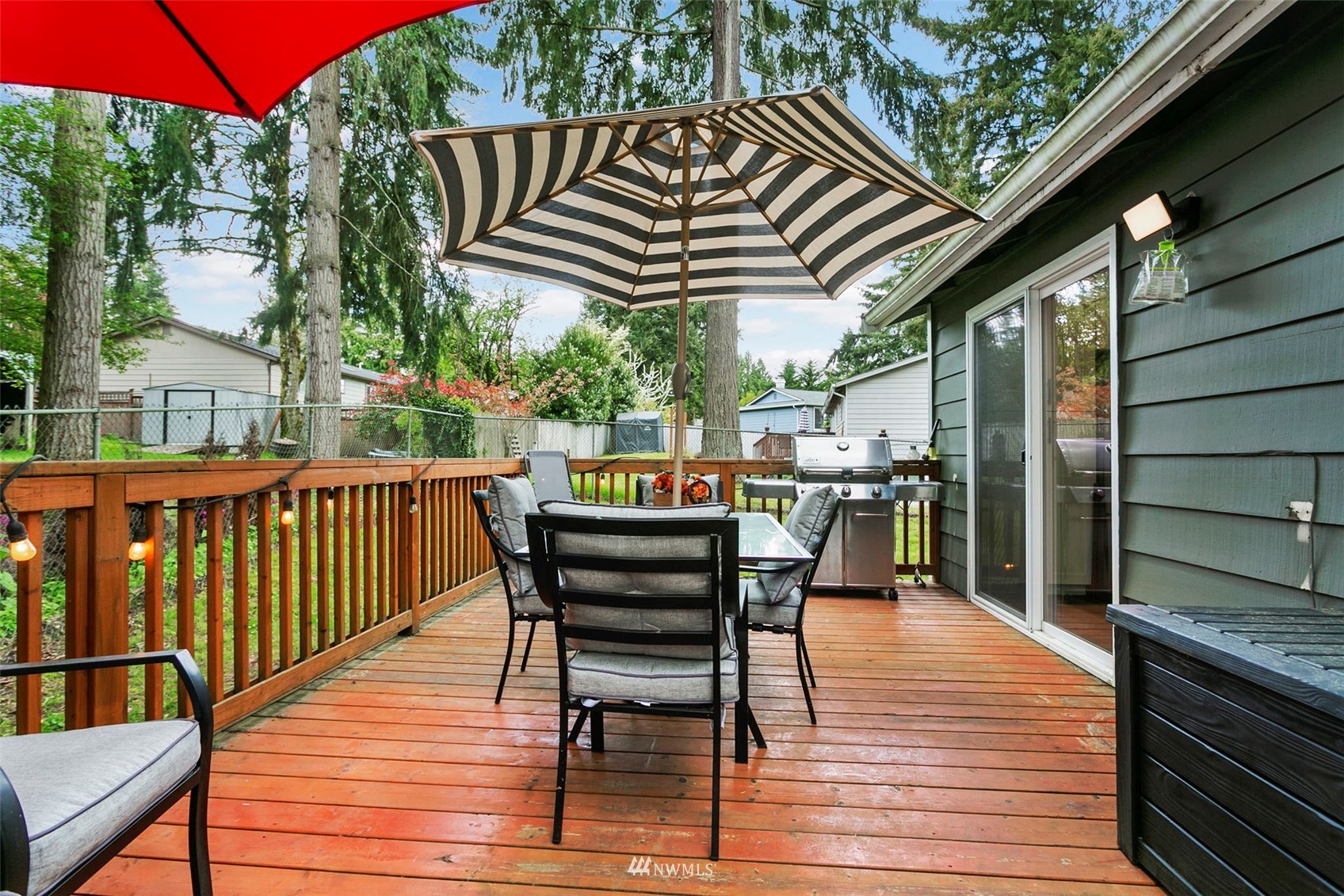 610 219th Place Southwest Bothell, WA 98021 - Photo 20 of 25 a view of a chairs and table on the deck