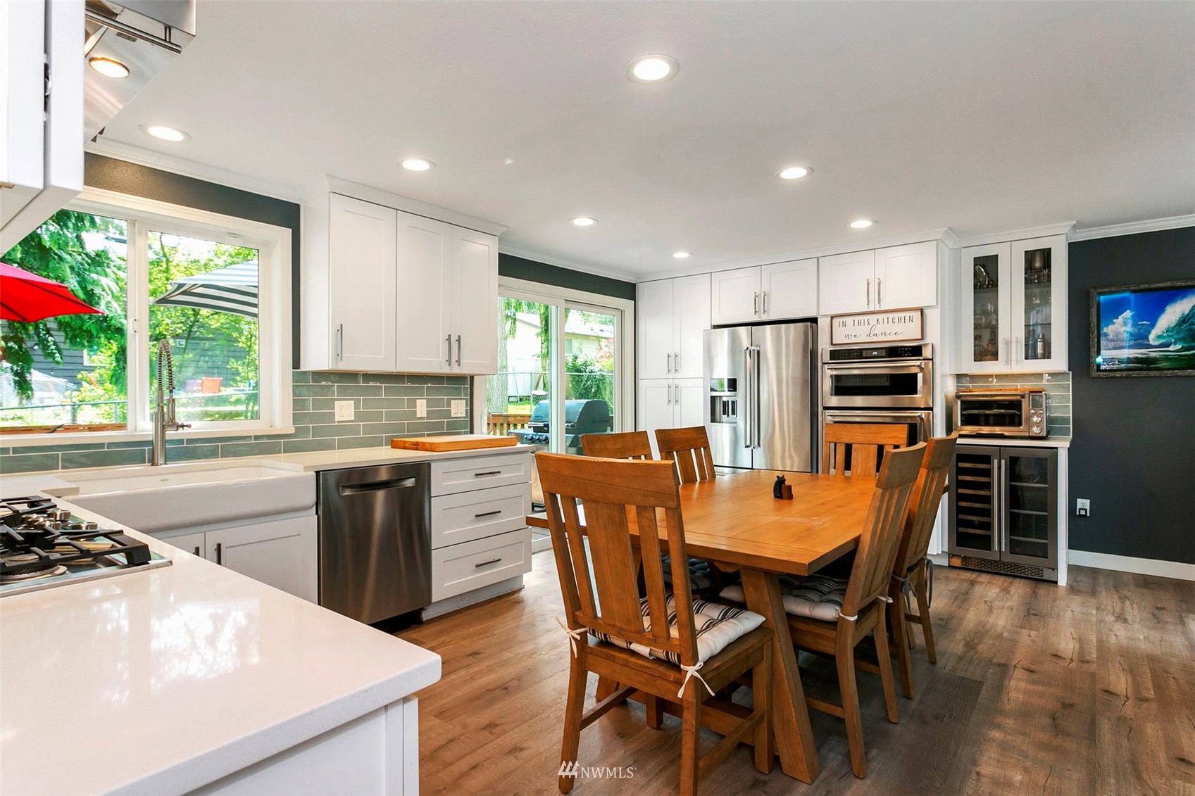 610 219th Place Southwest Bothell, WA 98021 - Photo 8 of 25 a large kitchen with a table and chairs in it