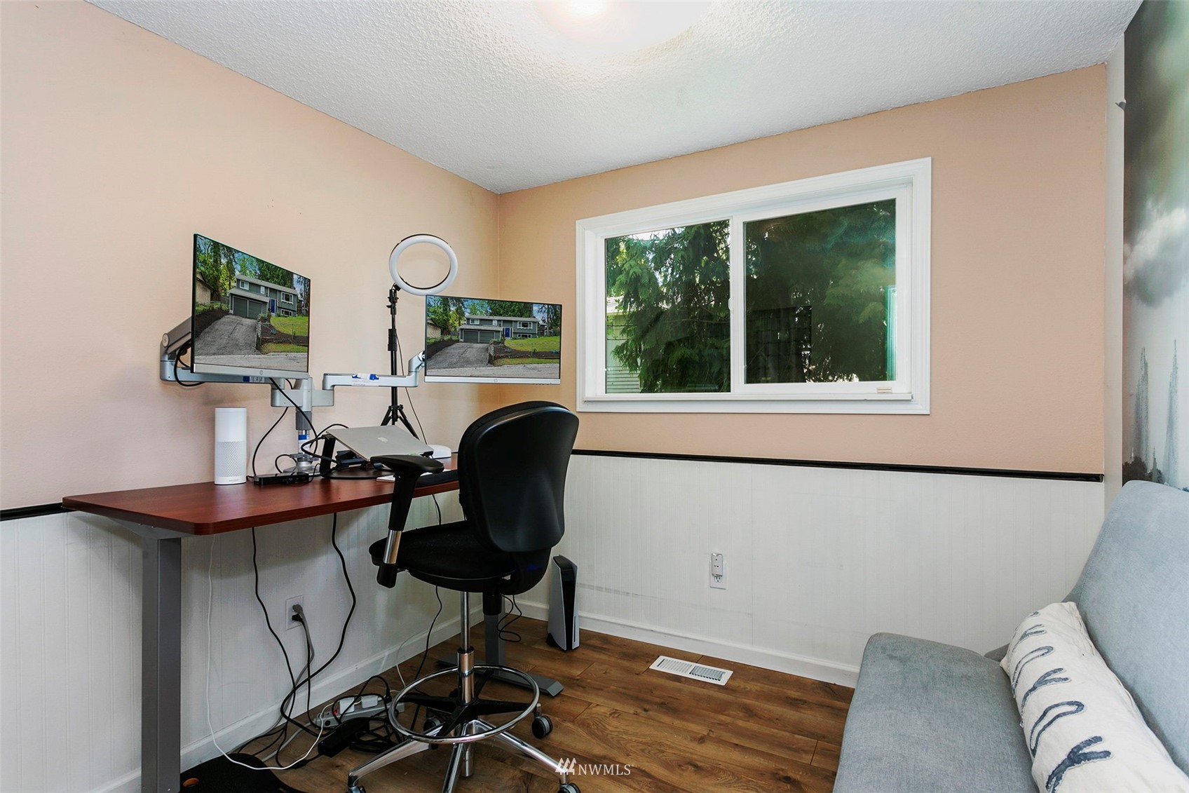 610 219th Place Southwest Bothell, WA 98021 - Photo 9 of 25 a work room with furniture and a window