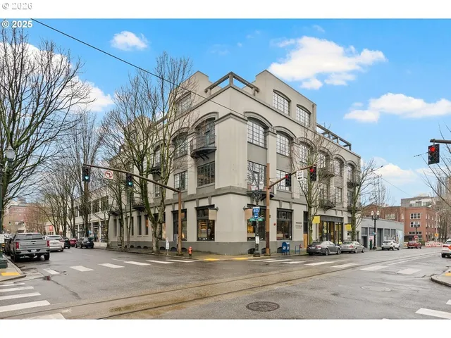 a view of a building with a street