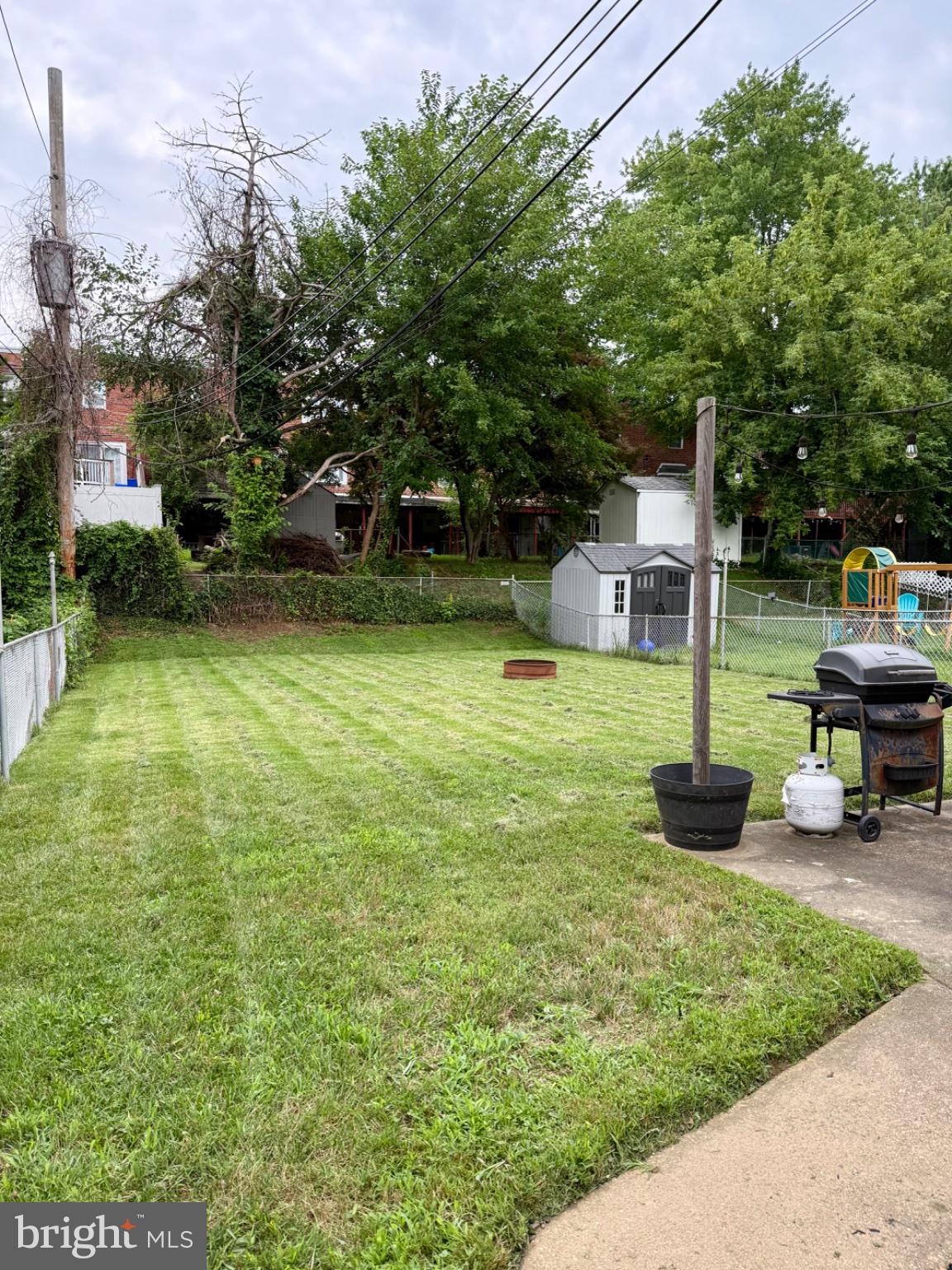12820 Elnora Road Philadelphia, PA 19154 - Photo 28 of 31 Spacious backyard with lush greenery.
